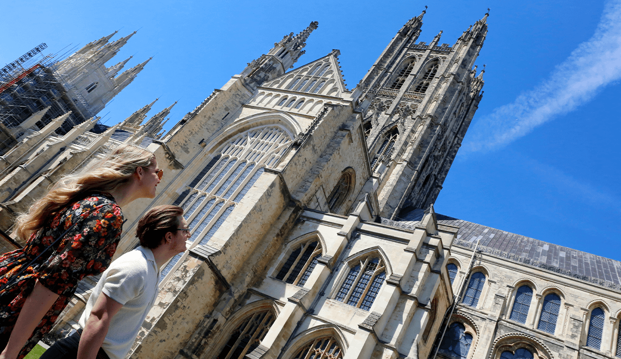 CC Couple Looking Up At Cathedral